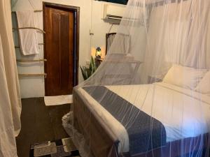 Postel nebo postele na pokoji v ubytování Camp Leopard - Yala Safari Glamping