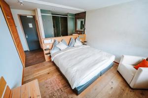 Postel nebo postele na pokoji v ubytování Hotel Eden Wellness