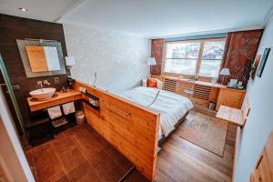 Postel nebo postele na pokoji v ubytování Hotel Eden Wellness