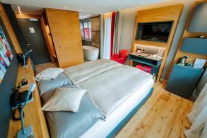 Postel nebo postele na pokoji v ubytování Hotel Eden Wellness
