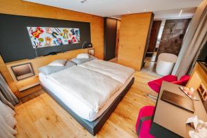 Postel nebo postele na pokoji v ubytování Hotel Eden Wellness
