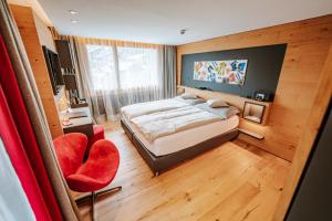 Postel nebo postele na pokoji v ubytování Hotel Eden Wellness