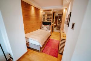 Postel nebo postele na pokoji v ubytování Hotel Eden Wellness