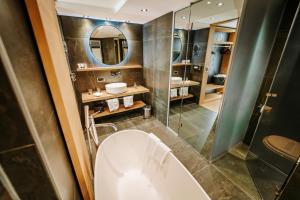Koupelna v ubytování Hotel Eden Wellness