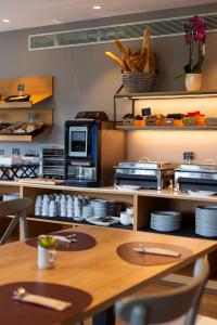 Una cocina o zona de cocina en Hotel Santiago Apóstol