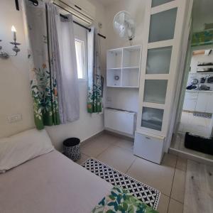 Postel nebo postele na pokoji v ubytování bugrashov 13 room + 32 fotografií