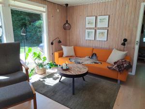 Posezení v ubytování Huset ved Følle vig