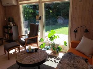 Posezení v ubytování Huset ved Følle vig + 15 fotografií