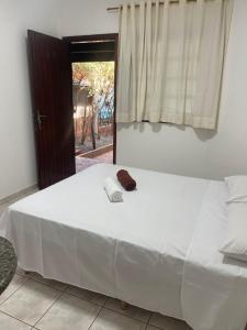 Rúm í herbergi á Hotel Marambaia Ponta Porã