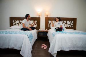 Postel nebo postele na pokoji v ubytování Hotel Tres Soles