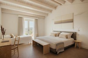 Postel nebo postele na pokoji v ubytování NUALI - Stazzo in Gallura