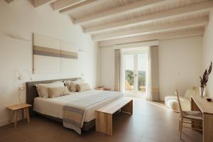 Postel nebo postele na pokoji v ubytování NUALI - Stazzo in Gallura
