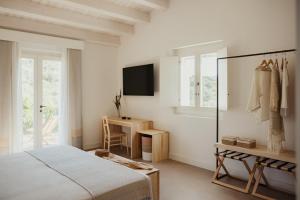 Postel nebo postele na pokoji v ubytování NUALI - Stazzo in Gallura