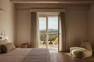 Postel nebo postele na pokoji v ubytování NUALI - Stazzo in Gallura