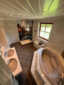 Kúpeľňa v ubytovaní Home-Schusterwastl