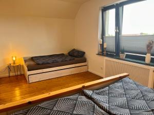 Posezení v ubytování Ferienwohnung Am Langenberg
