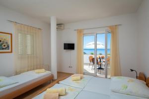 Giường trong phòng chung tại Villa Ruza