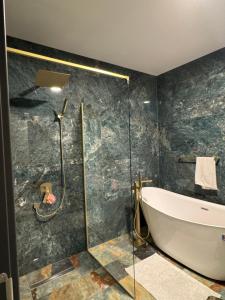 Koupelna v ubytování Cupcake Apartments + 49 fotografií