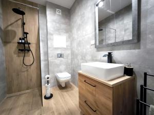 Koupelna v ubytování Apartmány Karpatia s privátnym parkovaním + 18 fotografií