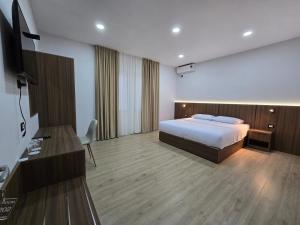 Postel nebo postele na pokoji v ubytování Hotel Aleks