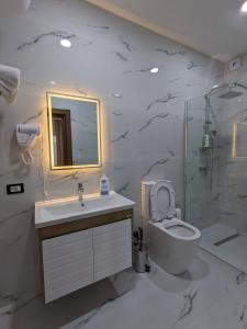 Koupelna v ubytování Hotel Aleks
