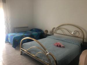 Postel nebo postele na pokoji v ubytování Dal Contadino