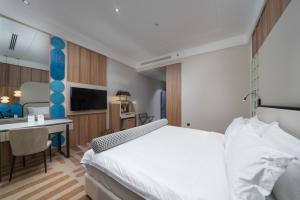 Sunway Tabuk Hotel客房内的一张或多张床位