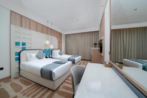 Postel nebo postele na pokoji v ubytování Sunway Tabuk Hotel + 36 fotografií