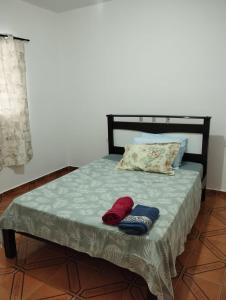 Postelja oz. postelje v sobi nastanitve Quarto com cama de casal - Sobrado