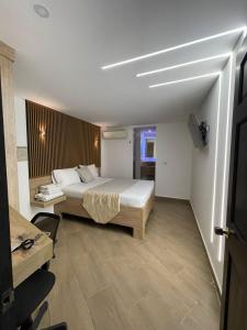 Voodi või voodid majutusasutuse Hotel Plaza Norte Cali toas