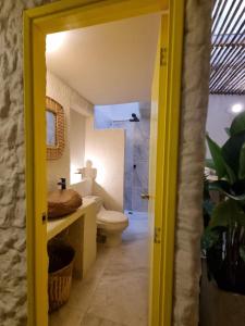 Ένα ή περισσότερα κρεβάτια σε δωμάτιο στο Mascomunal hostel