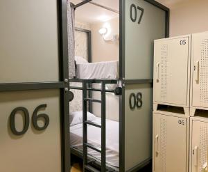 Ένα ή περισσότερα κρεβάτια σε δωμάτιο στο Mascomunal hostel