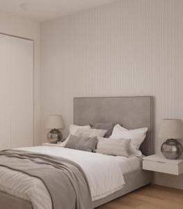 Postel nebo postele na pokoji v ubytování Bursztynowe Apartamenty Resort & SPA Prywatnie