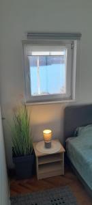 Postel nebo postele na pokoji v ubytování Apartman Vito