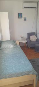 Postel nebo postele na pokoji v ubytování Apartman Vito + 27 fotografií