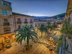 an aerial view of a city with palm trees at Palm Residence in Lamezia Terme
