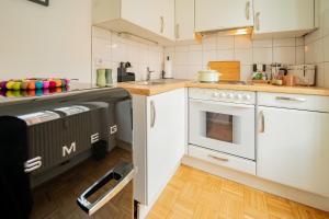 Kuchyň nebo kuchyňský kout v ubytování Marktbar Studios - Boutique Aparthotel