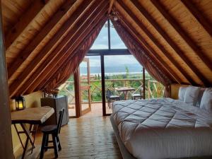 Ένα ή περισσότερα κρεβάτια σε δωμάτιο στο Glamping Guarupaque