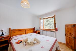 Posteľ alebo postele v izbe v ubytovaní Miramonti 21 Ski In - Ski Out - Happy Rentals
