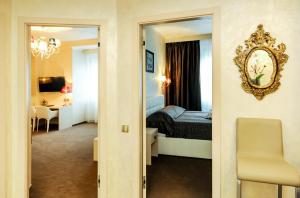 Posteľ alebo postele v izbe v ubytovaní Myo Hotel Mysterius