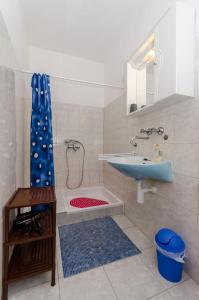 Et badeværelse på Apartments Nedeljko