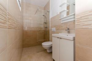 Et badeværelse på Apartments Nedeljko