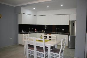 Kuchyň nebo kuchyňský kout v ubytování Osmenaj apartment