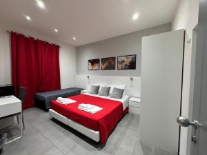 A bed or beds in a room at Affittacamere Sikelia