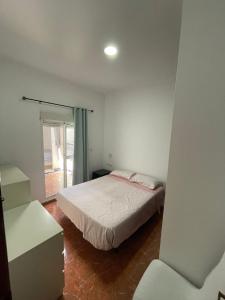Postel nebo postele na pokoji v ubytování Apartamento La Línea 1