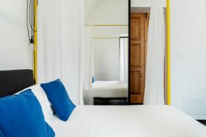 Voodi või voodid majutusasutuse Palazzo Biancofiore, suites & rooftop toas