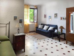 a living room with a couch and a table at Malachè in Torchiara