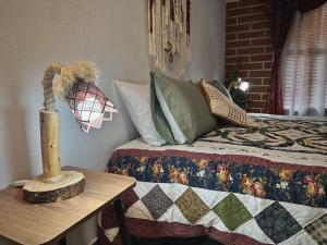 Letto o letti in una camera di Casa Amaru