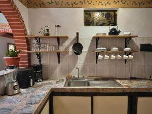 Cucina o angolo cottura di Casa Amaru