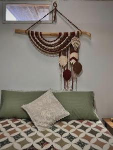 Letto o letti in una camera di Casa Amaru